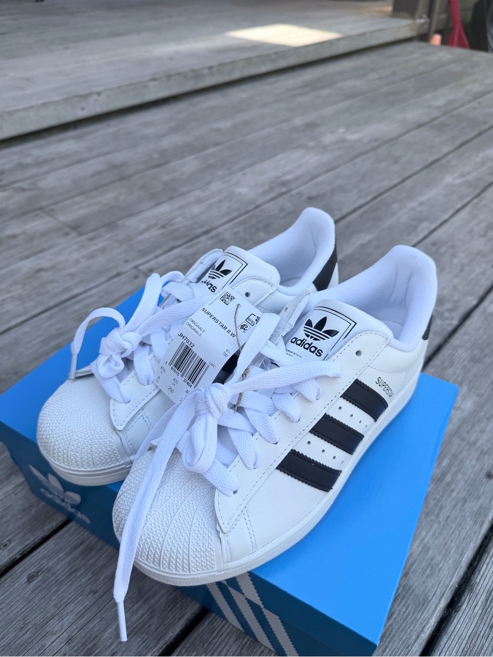 adidas White and Black Superstar Sneakers